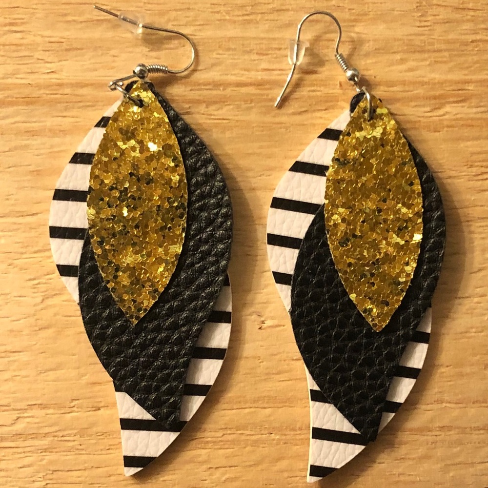 Handmade layered leather earrings.